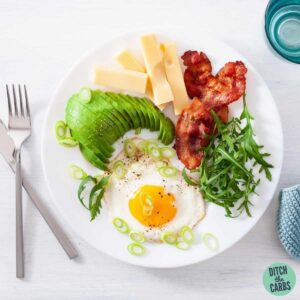 a white plate of keto fried breakfast