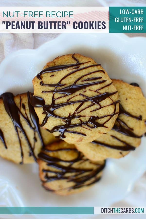 cookies on bakig parchment drizzled with sugar-free chocolate