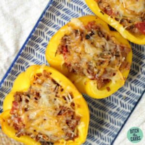 yellow stuffed peppers with a low-carb filing and melted cheese