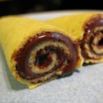 Low carb crêpes rolled up with sugar free chocolate sauce inside