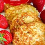 Low carb coconut pancakes served with fresh strawberries