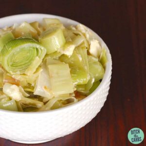 creamed leeks in a white bowl