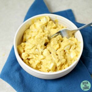 creamy egg salad served in a white bowl