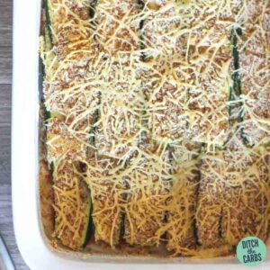 Zucchini and parmesan bake with an almond crust served on a large white baking dish