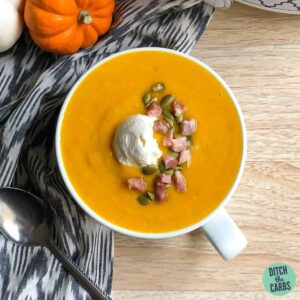 keto pumpkin soup in a white mug