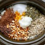 Grain free granola ingredients sitting in the slow-cooker 