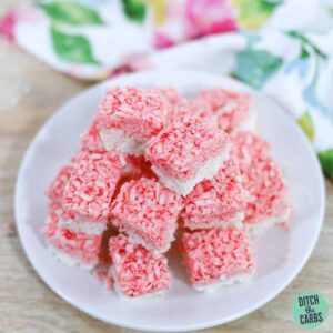 sugar-free coconut ice cut into squares on a white plate