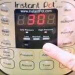 Hand pressing the Instant Pot timer