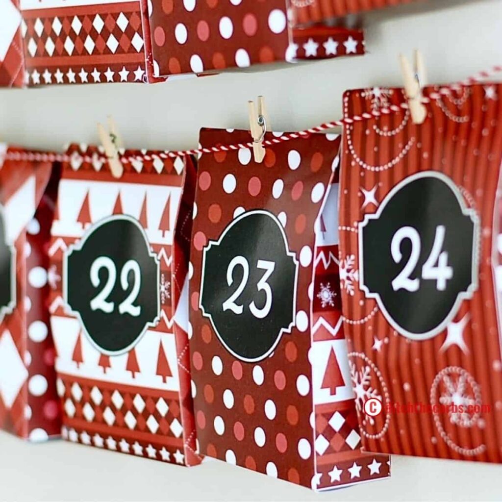 sugar free advent calendar hanging on string on a white wall