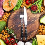 Many different types of keto food on a wooden table 