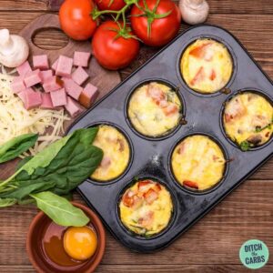 baked ham and egg cups baked in a muffin tray