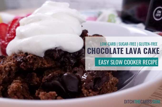 A close up of a slow cooker chocolate lava cake served with whipped cream