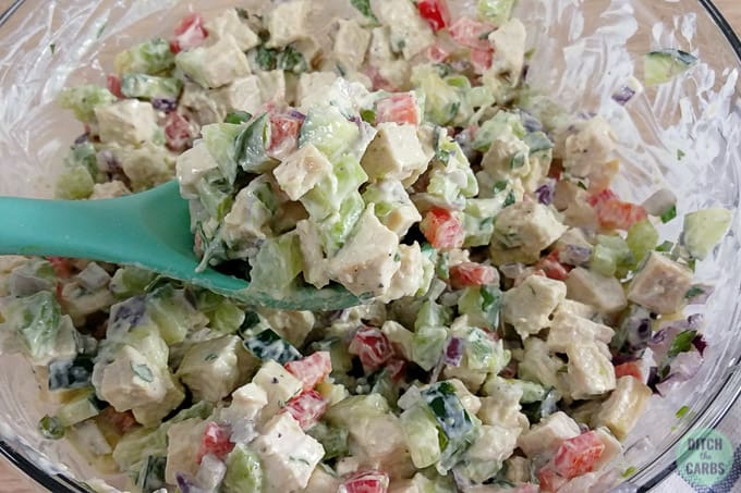 A bowl of salad with chopped chicken and mayonnaise