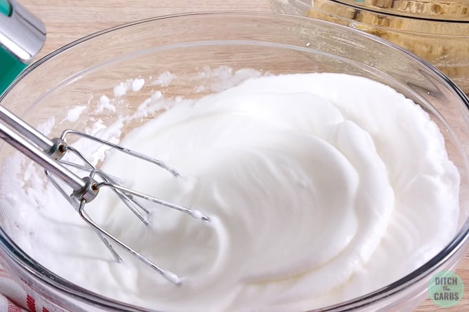 A mixing bowl with whipped egg whites
