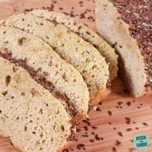 coconut flour bread sliced on a bread board