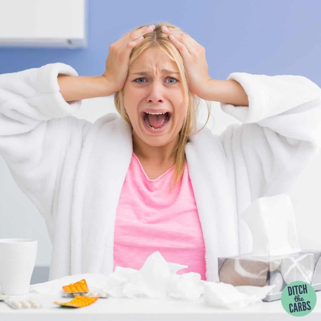 Stressed woman screaming in her white dressing gown