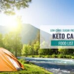 Keto camping food list with image of tent by the river