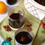 2 glasses of low carb mulled wine in front of the slow cooker