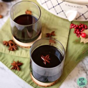 slow-cooker mulled wine in glasses with star anise and cinnamon sticks