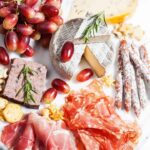 charcuterie board with a white background
