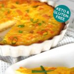 sliced keto smoked salmon quiche with a white plate