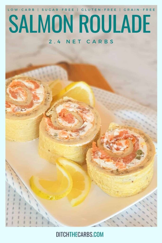 rolled smoked salmon roulade sliced with lemons