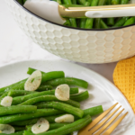 These Keto Garlicky Green Beans come together fast but pack a flavor-filled punch your whole family will love! They're the perfect side dish!