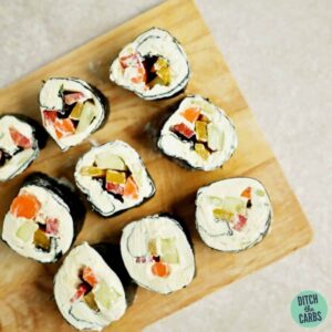 Sushi on a wooden chopping board