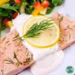 Instant pot poached lemon salmon with dill mayonnaise served with lemon slice and fresh dill