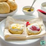 wheat free keto scones served with whipped cream and lemon curd
